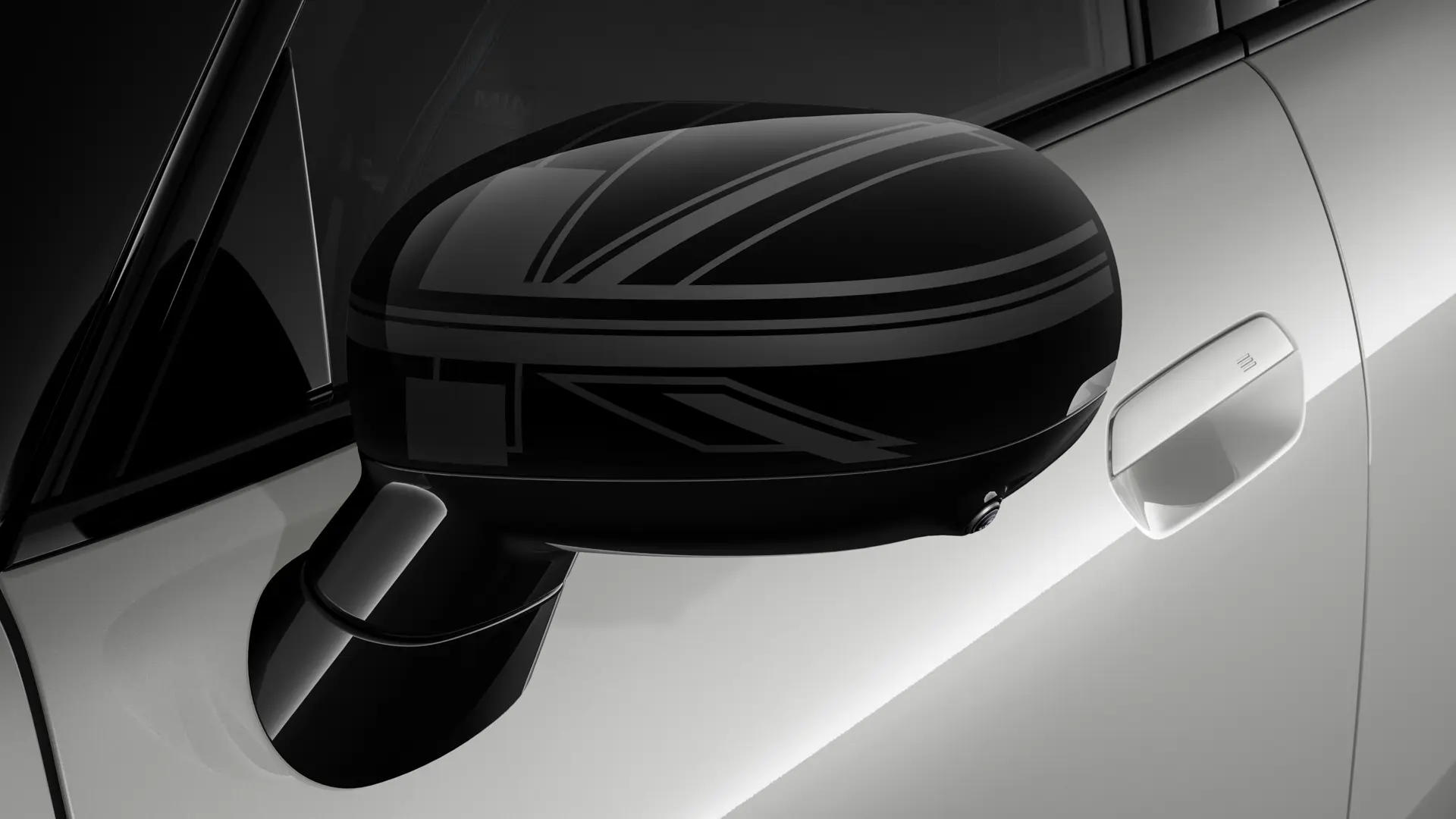 MINI Cooper 3-dörrars i silver med spegelkåpor i Night Union Jack-design.