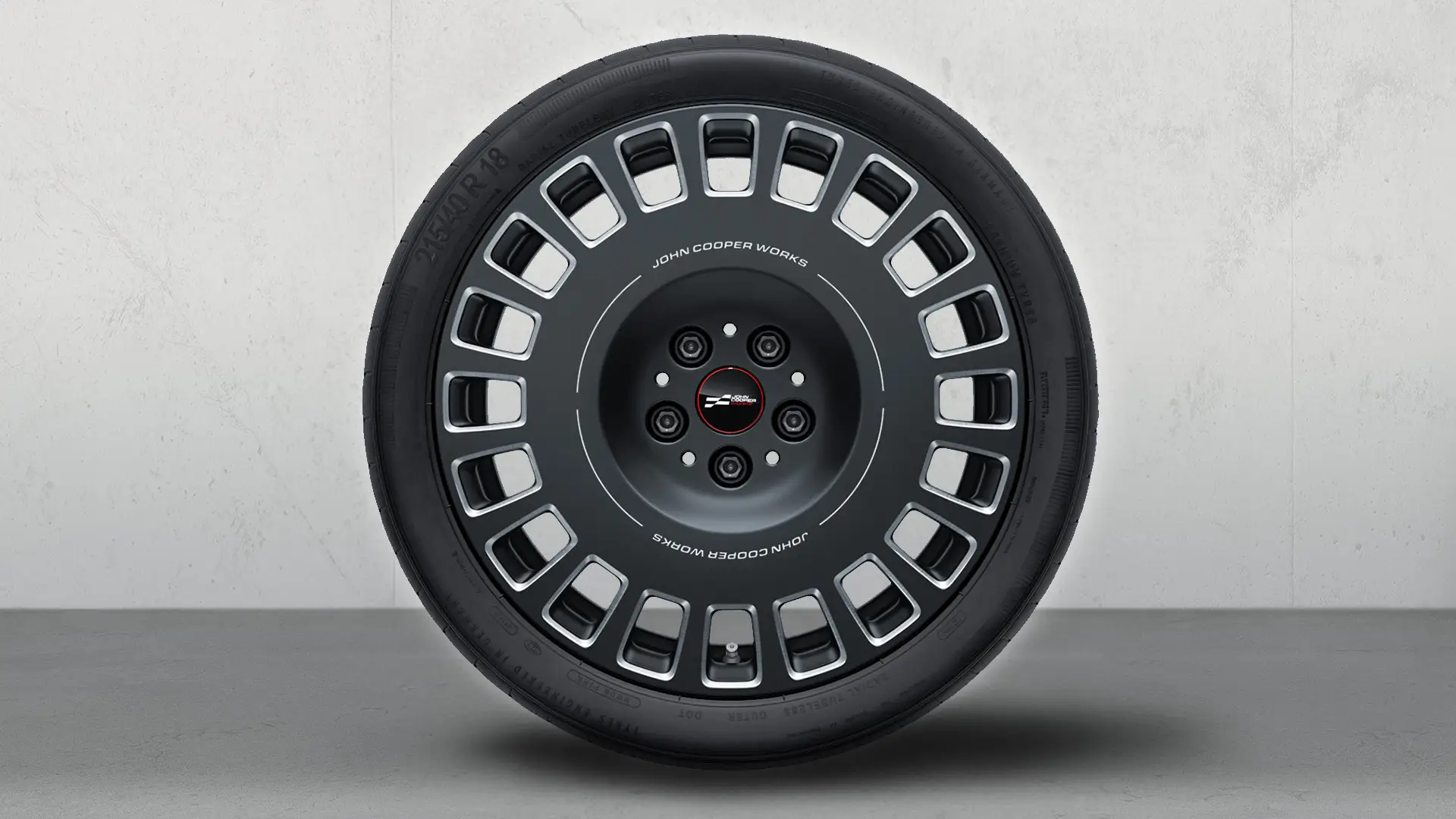 18" John Cooper Works lättmetallfälgar med rallyekrar 964 kompletta sommarhjul i tvåfärgad Midnight Grey, diamantslipade. 